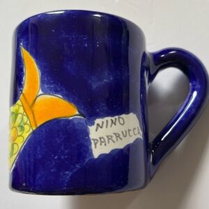 Hand painted Italy mermaid pottery mug Nino Parrucci royal blue crazing inside.